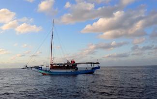 An illegal fishing boat with a mast which was seized and destroyed by Australian authorities in July 2025.