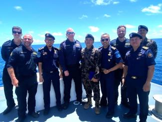 Group photo - 5 uniformed officers from Indonesia and 4 from Australia