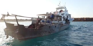 A foreign fishing vessel being apprehended in Australian waters