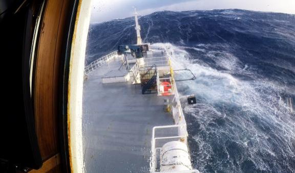 Boat caught in huge wave